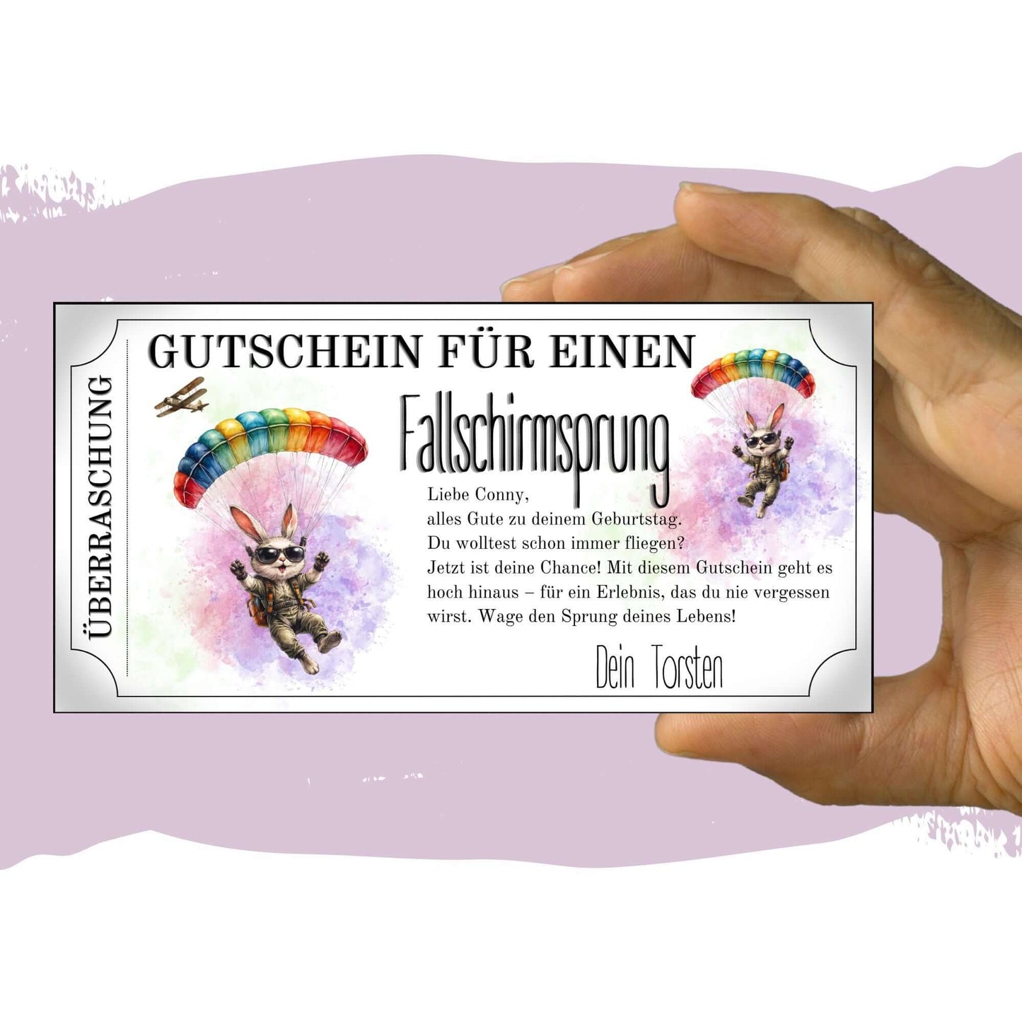 Witziger Fallschirmsprung Geschenkgutschein mit winkendem Mini-Hasen und Pastell-Aquarell