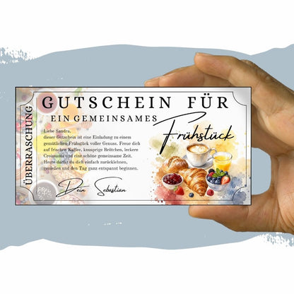 Frühstücksgutschein im Aquarell-Stil mit Croissant und Orangensaft